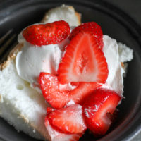 Angel food cake topped with strawberries.
