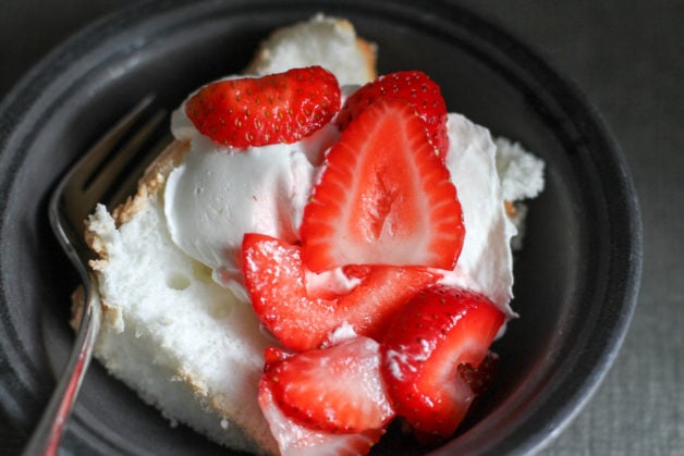 Angel food cake topped with strawberries.