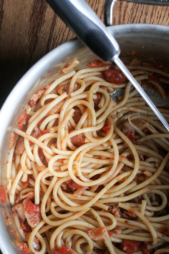 Bucatini pasta dish in a pot.