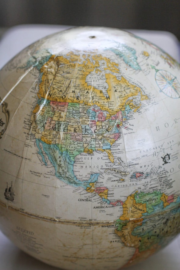 North American on a globe.