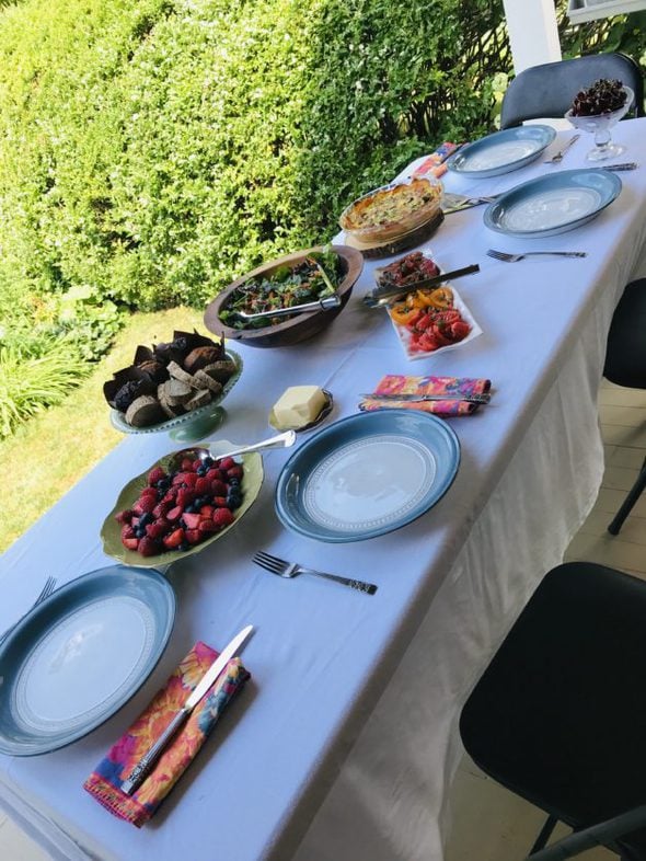 An outdoor dinner table set for entertaining.