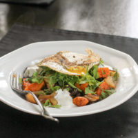 An egg, bean, and veggie bowl.