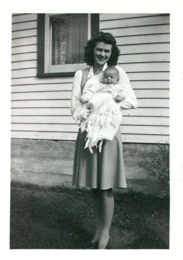 Kristen's grandma holding her dad as a baby.