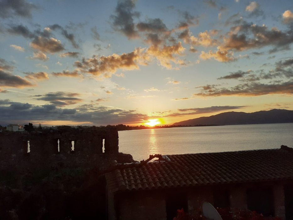 A sunrise over the water.