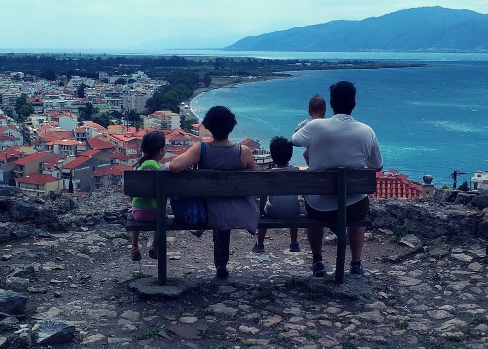 Efterpi's family on a bench.
