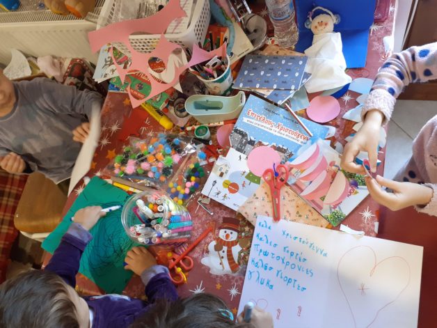 A craft-making mess on a table.