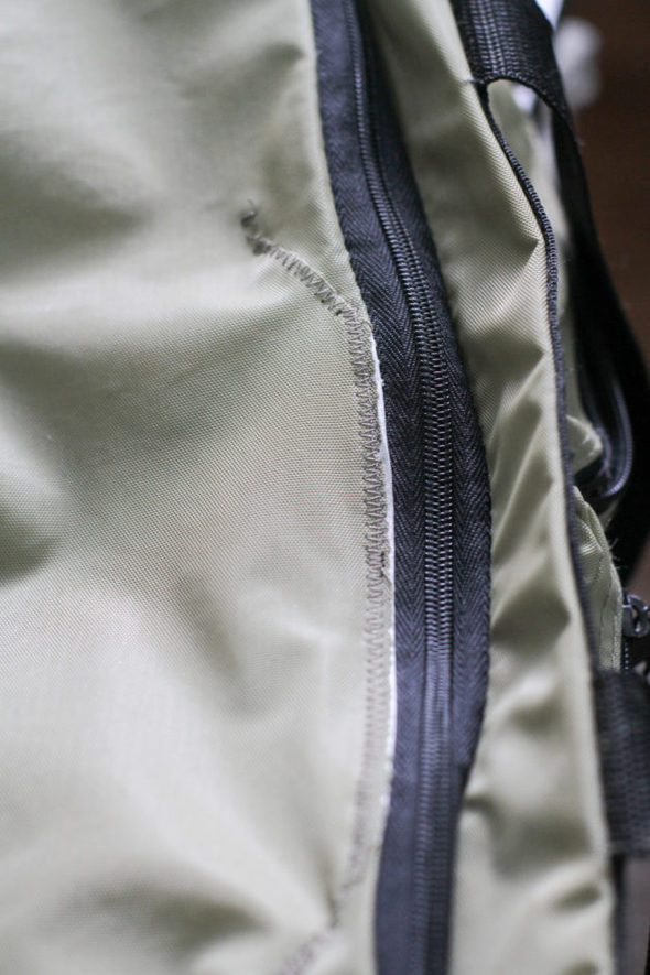 Zig-zag seam repair on a duffel.