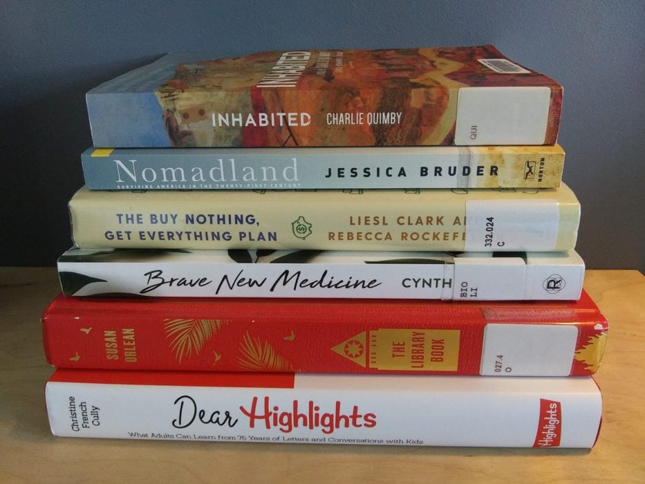 A stack of library books.