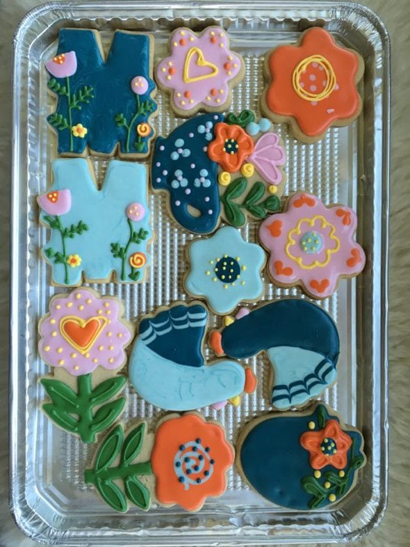 Flower cookies in a dish.