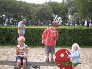 Children on a beachside bench.