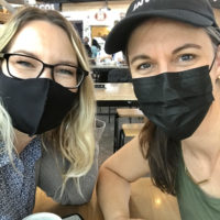 Kristen and Whitney with masks on.