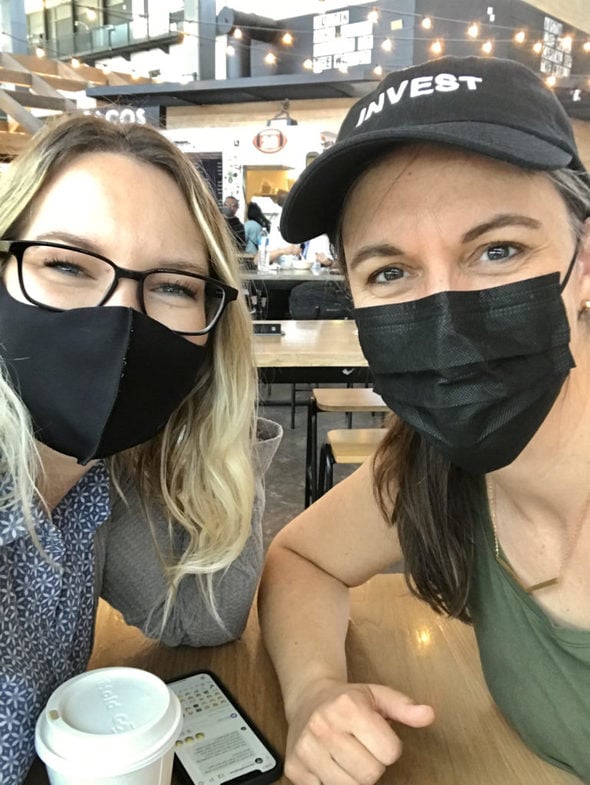 Kristen and Whitney with masks on.