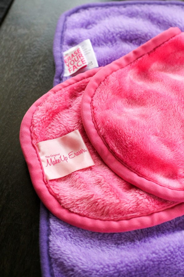 Makeup eraser cloths in pink and purple.