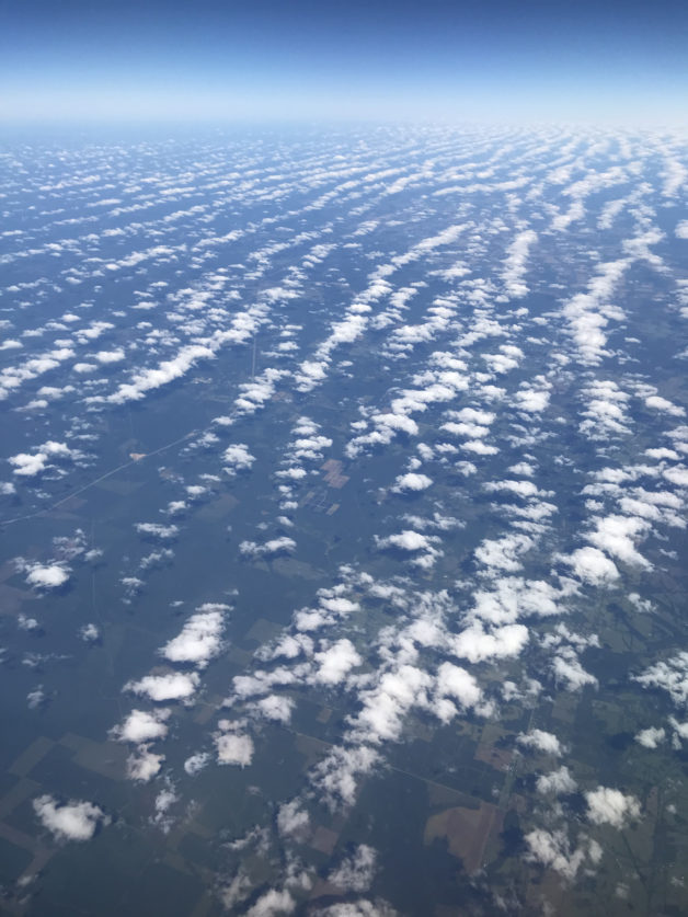 View of clouds from a plane window.