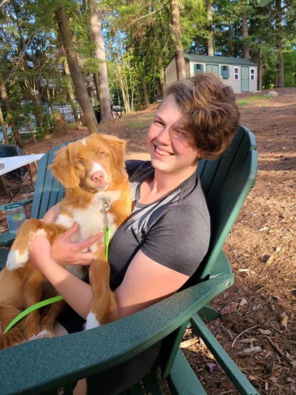 Susannah with her puppy.