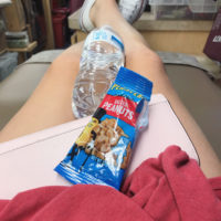 Kristen in a blood-donation chair.