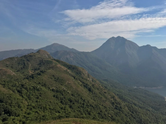 Mountain peaks under a blue sky.