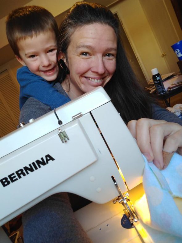 Dorinda at her sewing machine.