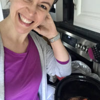 Kristen next to her crockpot.