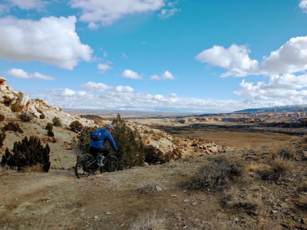 A man mountain biking.