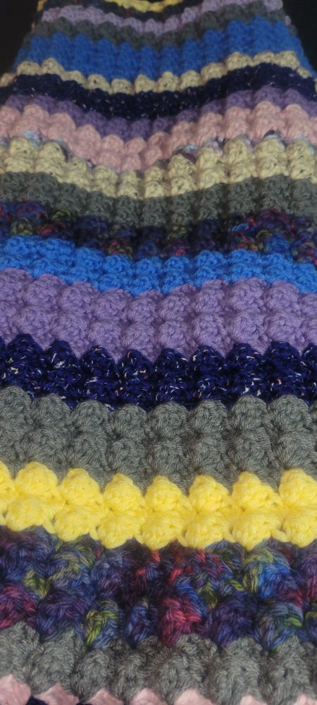 A crocheted blanket.
