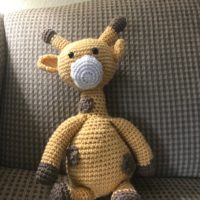 a crocheted giraffe.
