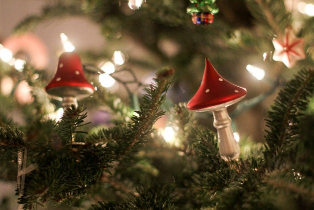 two red mushroom Christmas ornaments.