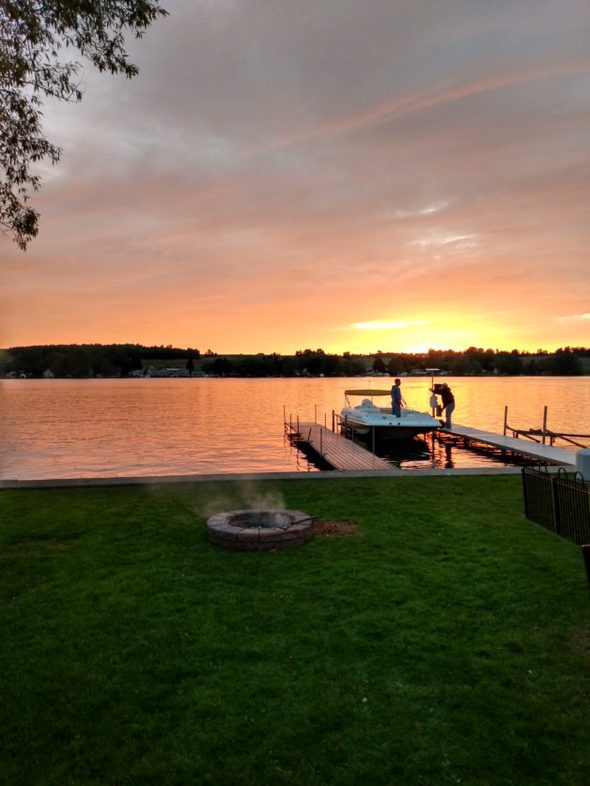 a dock at sunset.