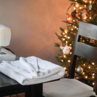 A mended white bath towel.