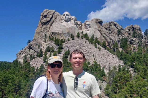 Beth in front of Mount Rushmore.