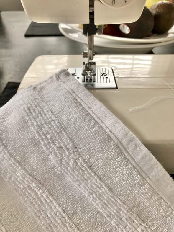 A mended white bath towel.