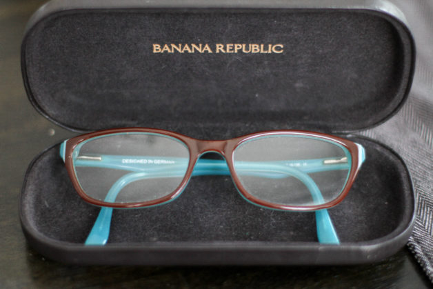 turquoise and brown glasses in a case.