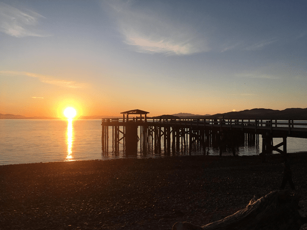 A sunset over a lake.