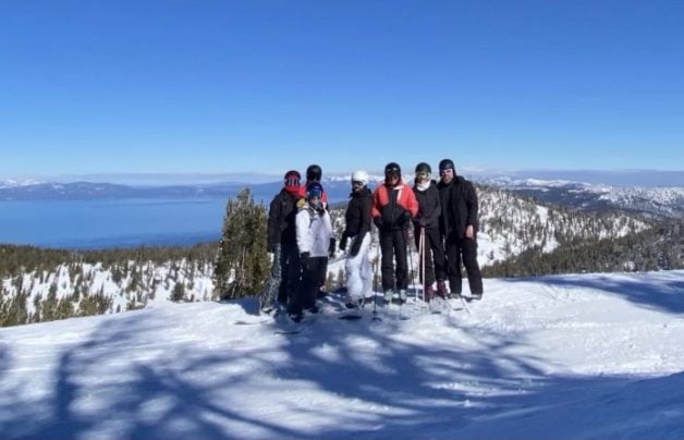 Kristen and family at the top of a California mountain.