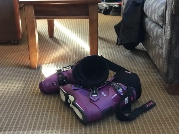 a pair of purple ski boots.