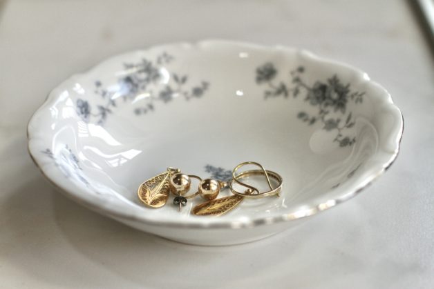 A white china bowl with blue flowers.