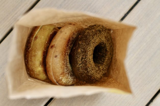 three bagels in a bag.