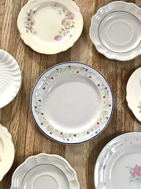 Clean dishes on a wood counter.