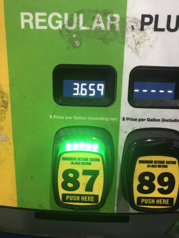 A green gas pump.