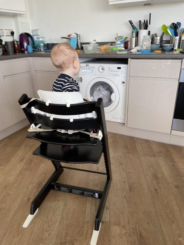 A baby in a highchair
