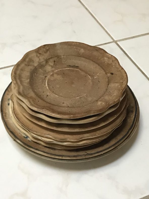 A stack of dirty plates.