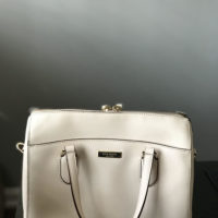 a pink Kate Spade purse.