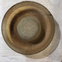 A dirty pyrex bundt pan.