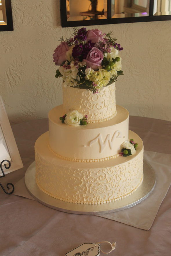 A three-tier wedding cake.