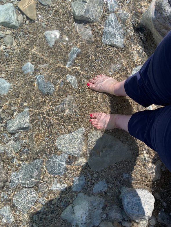 feet in lake water.