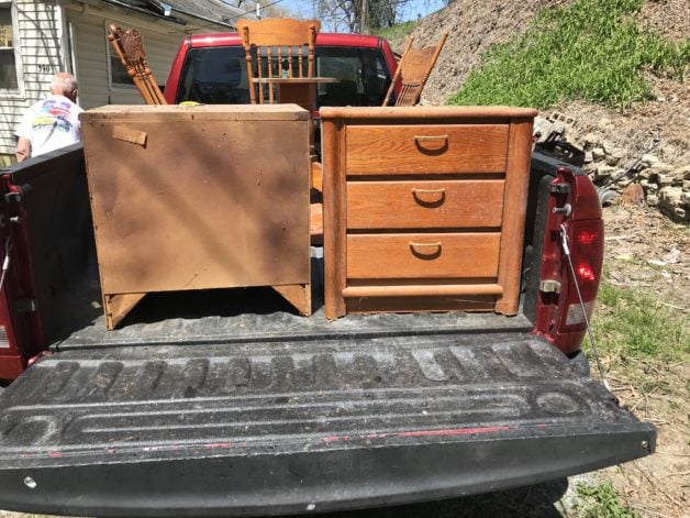 old furniture in a truck bed.