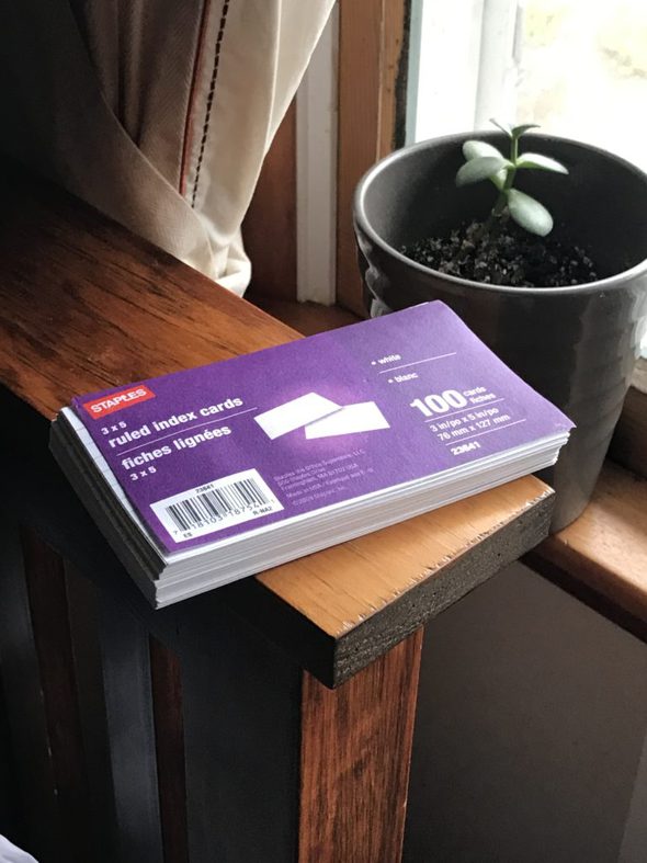 a stack of note cards.