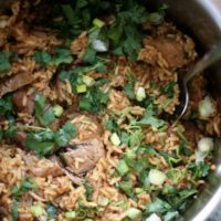 a stockpot of pork tinga.
