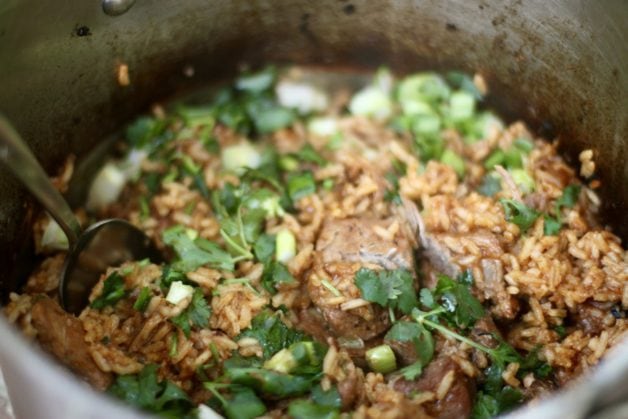 a pot of pork tinga and rice.