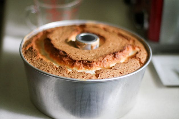 Angel food cake in aluminum pan.